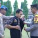 Polres Lampung Utara Gelar Upacara Bersama Mitra Polisi RW